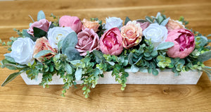 Wooden flower centrepiece in pink