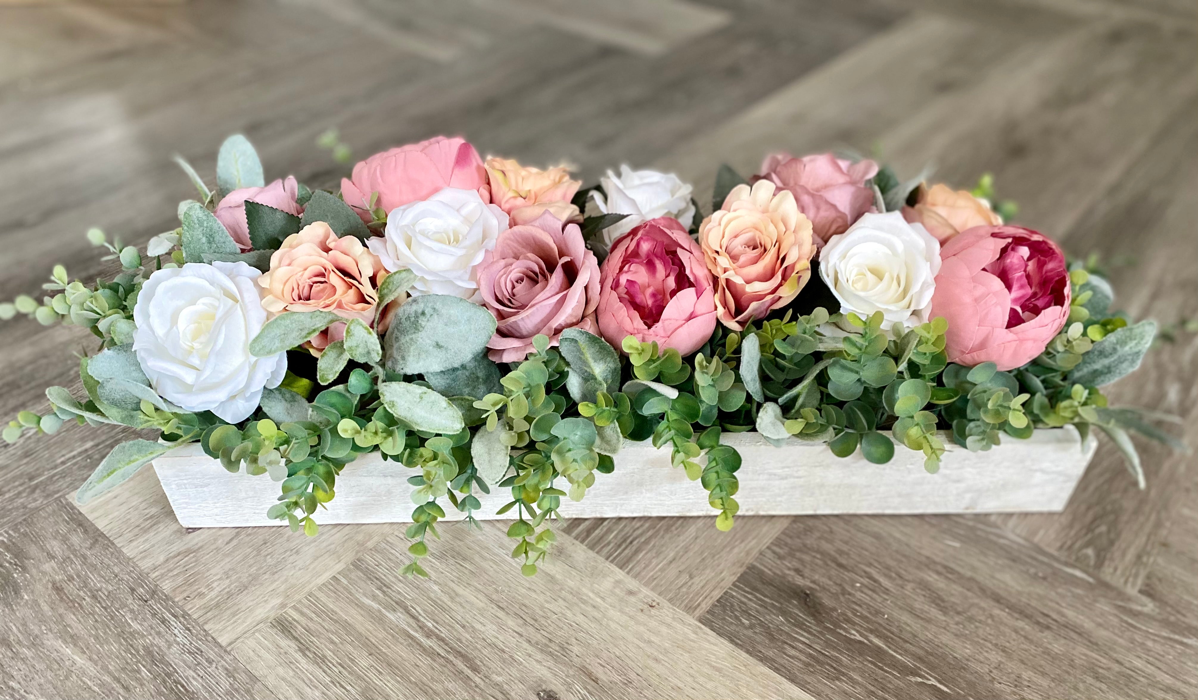 Wooden flower centrepiece in pink